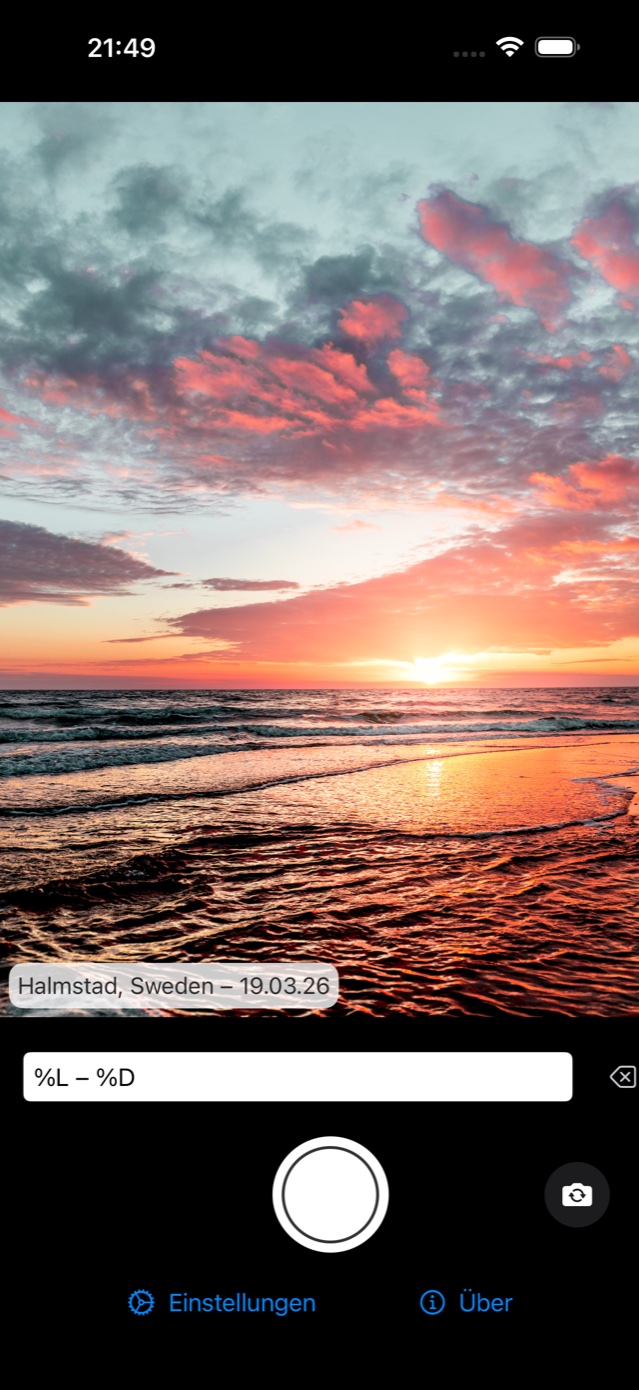 Foto Notes 1.x: eine einzelne Textzeile mit Ort und Datum auf demselben Strandfoto